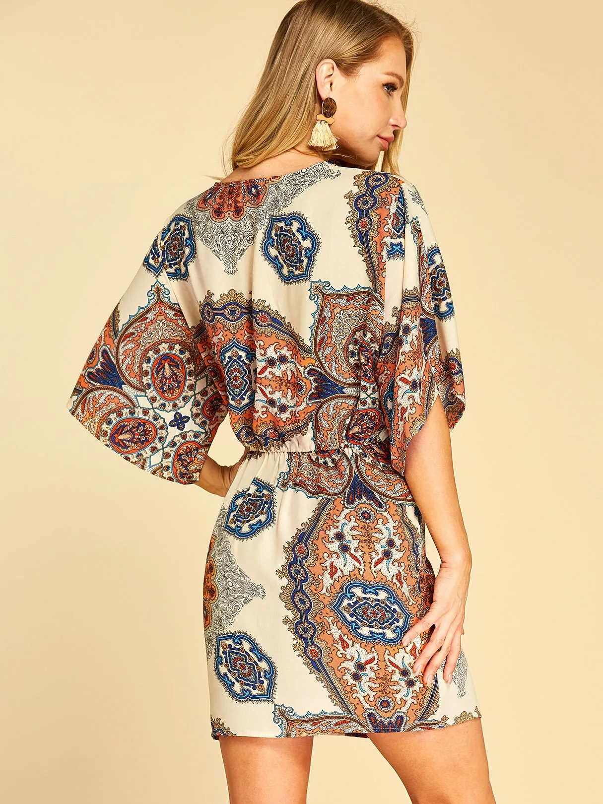 Wholesale Apricot Deep V Neck Half Sleeve Tribal Print Twist Wrap Dresses