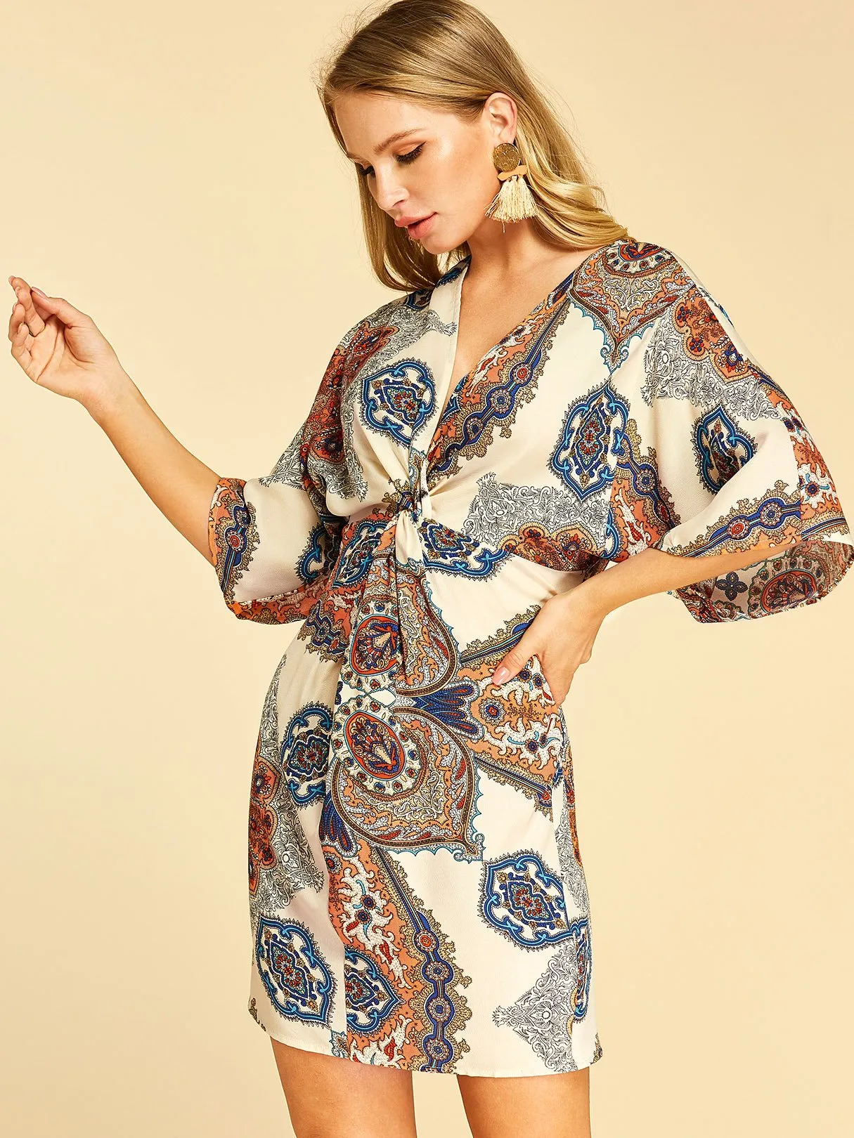 Wholesale Apricot Deep V Neck Half Sleeve Tribal Print Twist Wrap Dresses